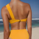 Back side Women's marigold ruched one shoulder bikini top in textured Italian swim fabric