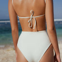 Back side Women's white cut out one piece swimsuit in recycled Italian swim fabric